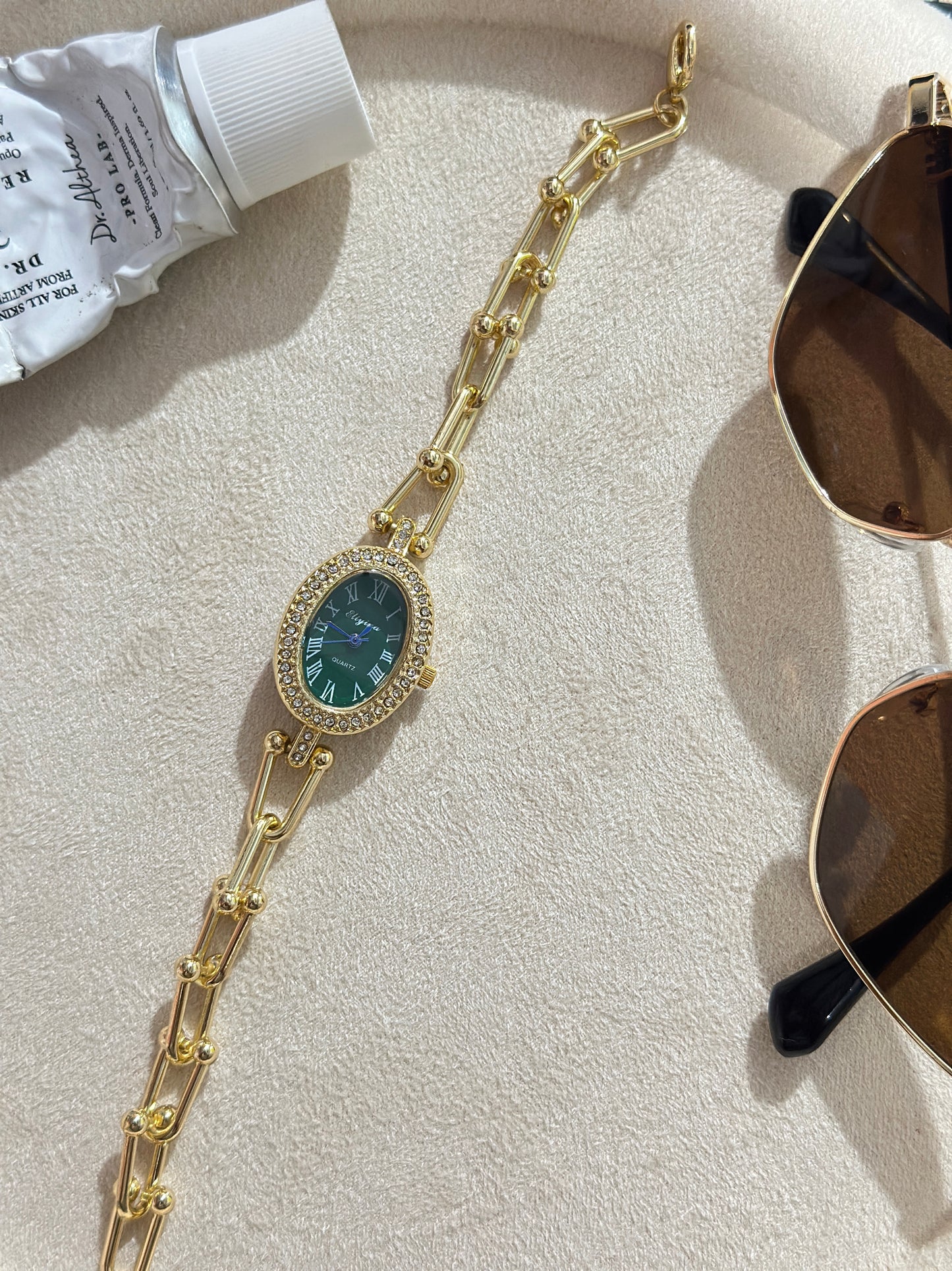 Oval CZ Halo Roman Dial Gold Chain Watch