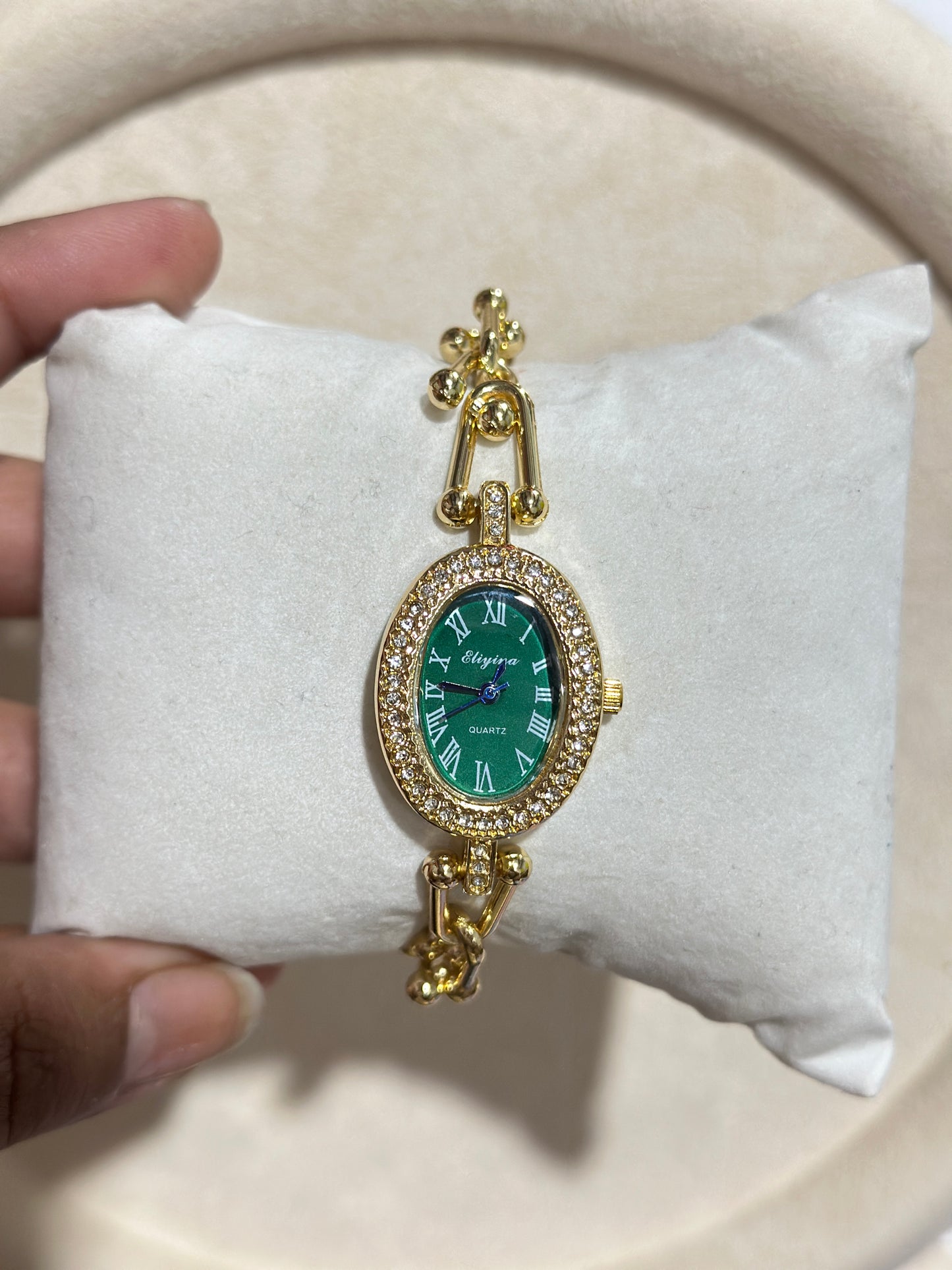 Oval CZ Halo Roman Dial Gold Chain Watch