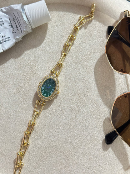 Oval CZ Halo Roman Dial Gold Chain Watch