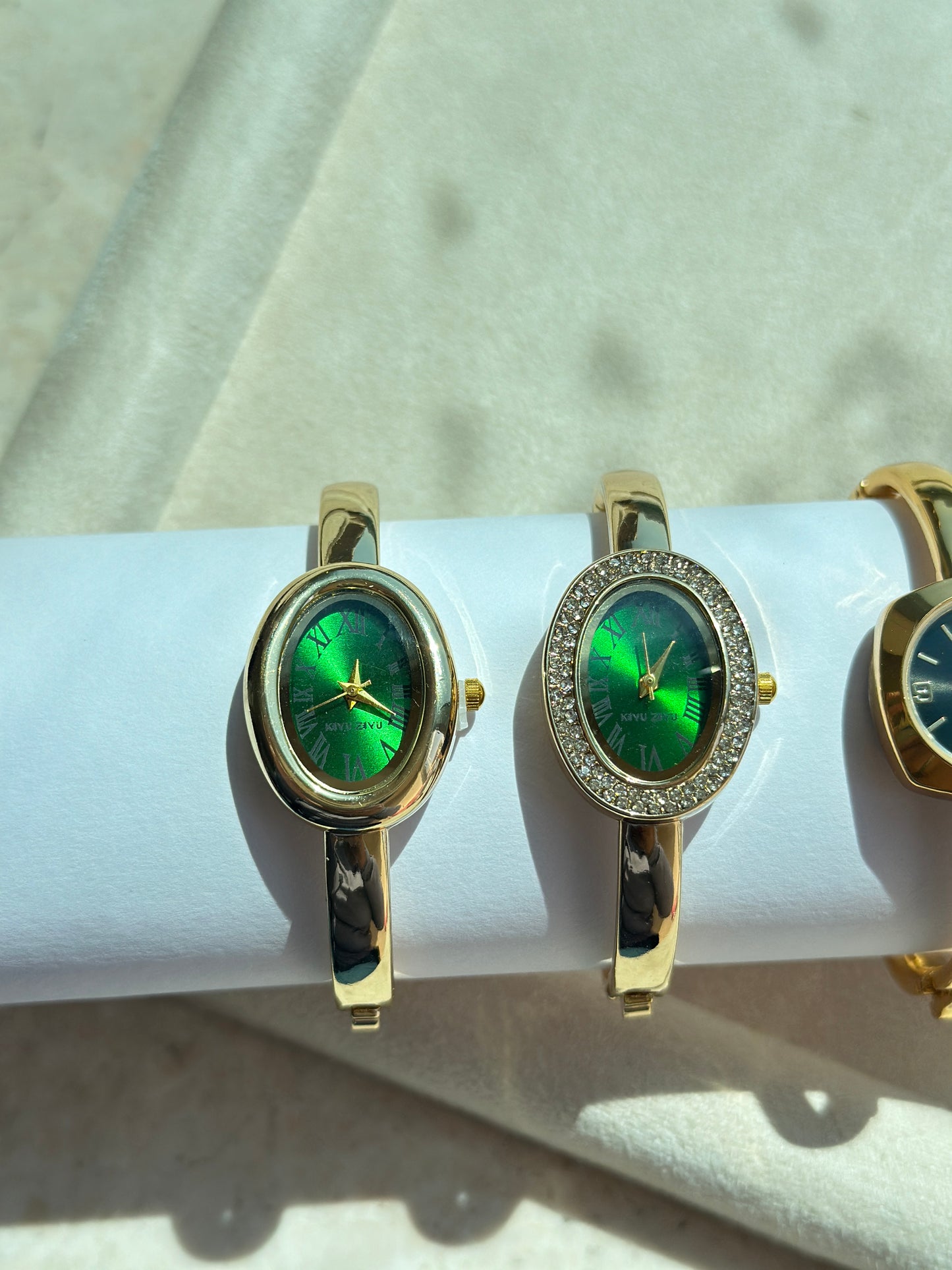 Oval Green Roman Dial Gold Bangle Watch