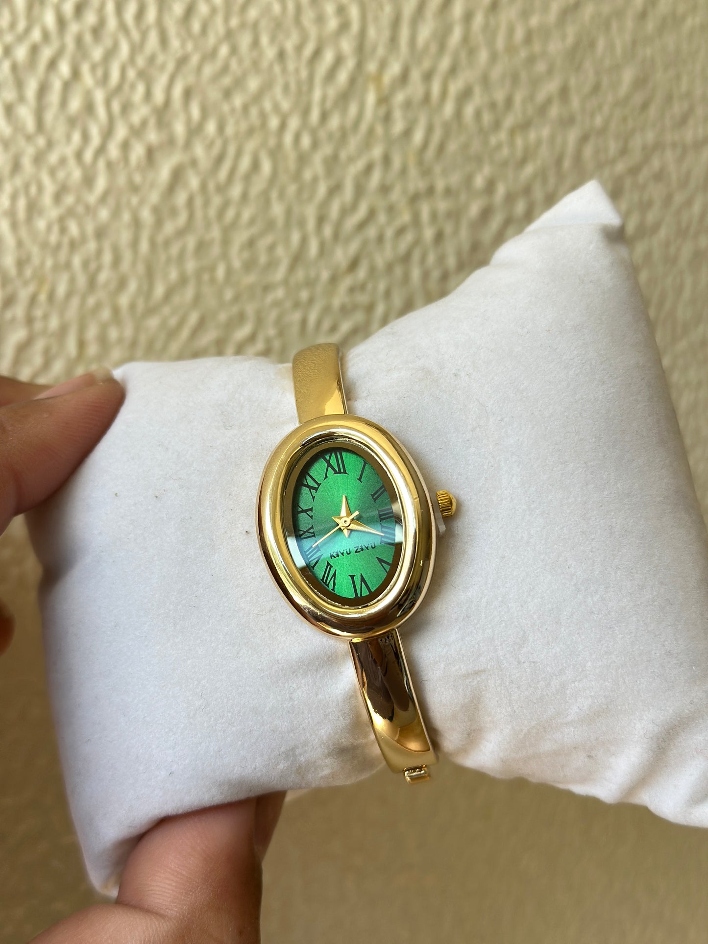 Oval Green Roman Dial Gold Bangle Watch