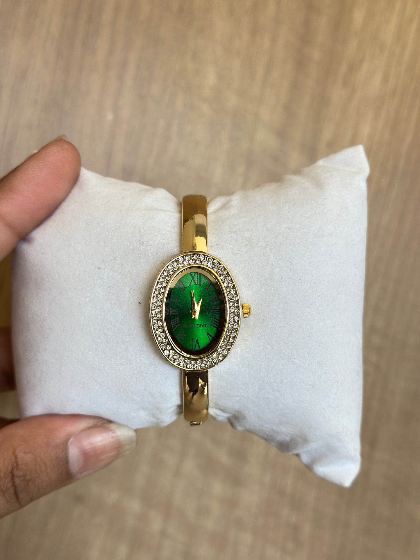 Oval Green Roman Dial Gold Bangle Watch