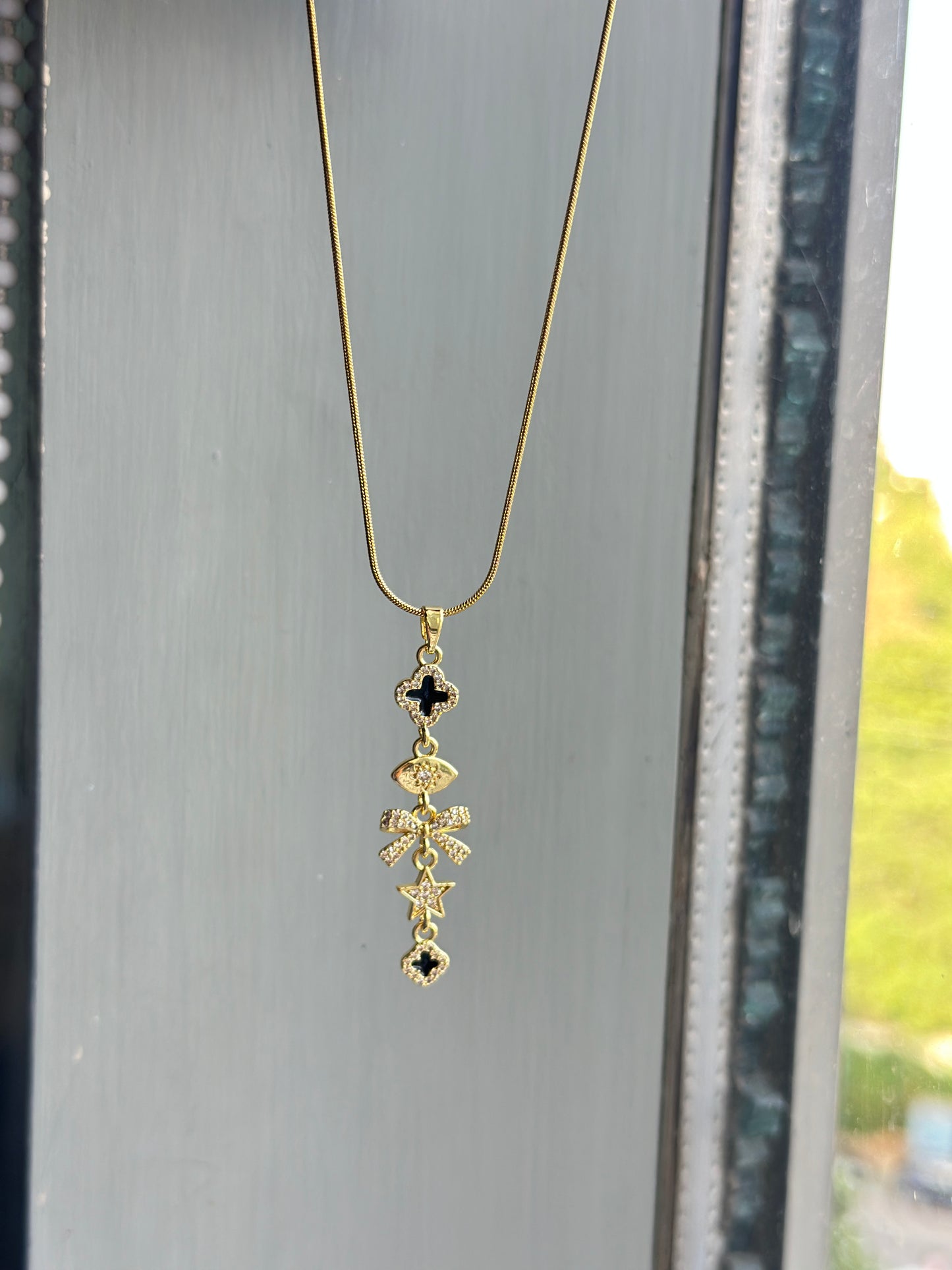 Black CZ Star Bow & Clover Long Drop Charm Necklace