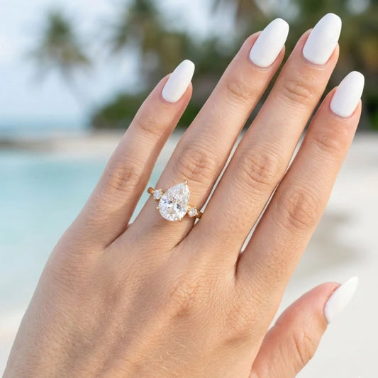Pear CZ Solitaire Ring with Side Stones