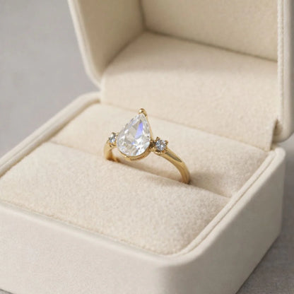 Pear CZ Solitaire Ring with Side Stones